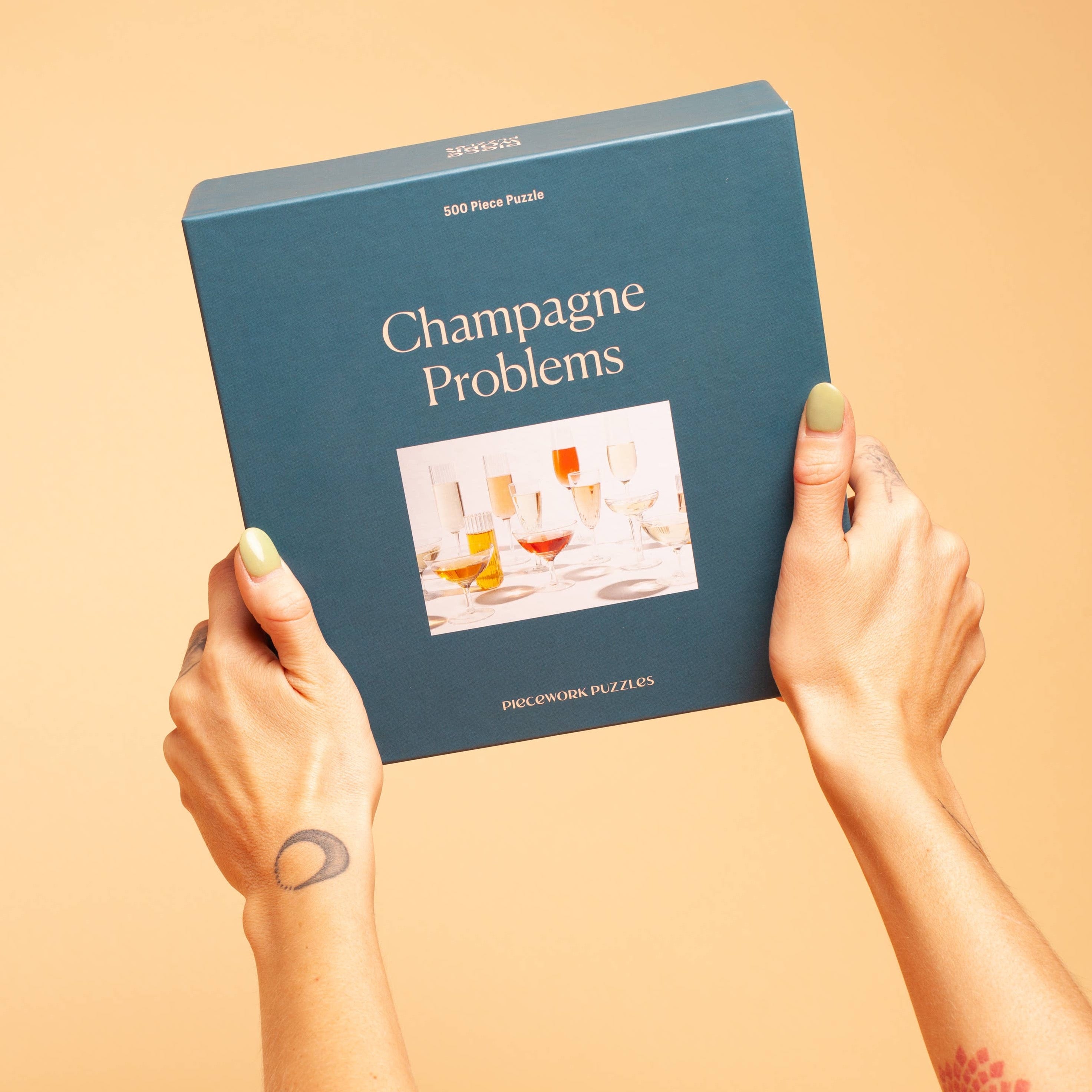 Champagne Problems 500 Piece Puzzle by Piecework Puzzles