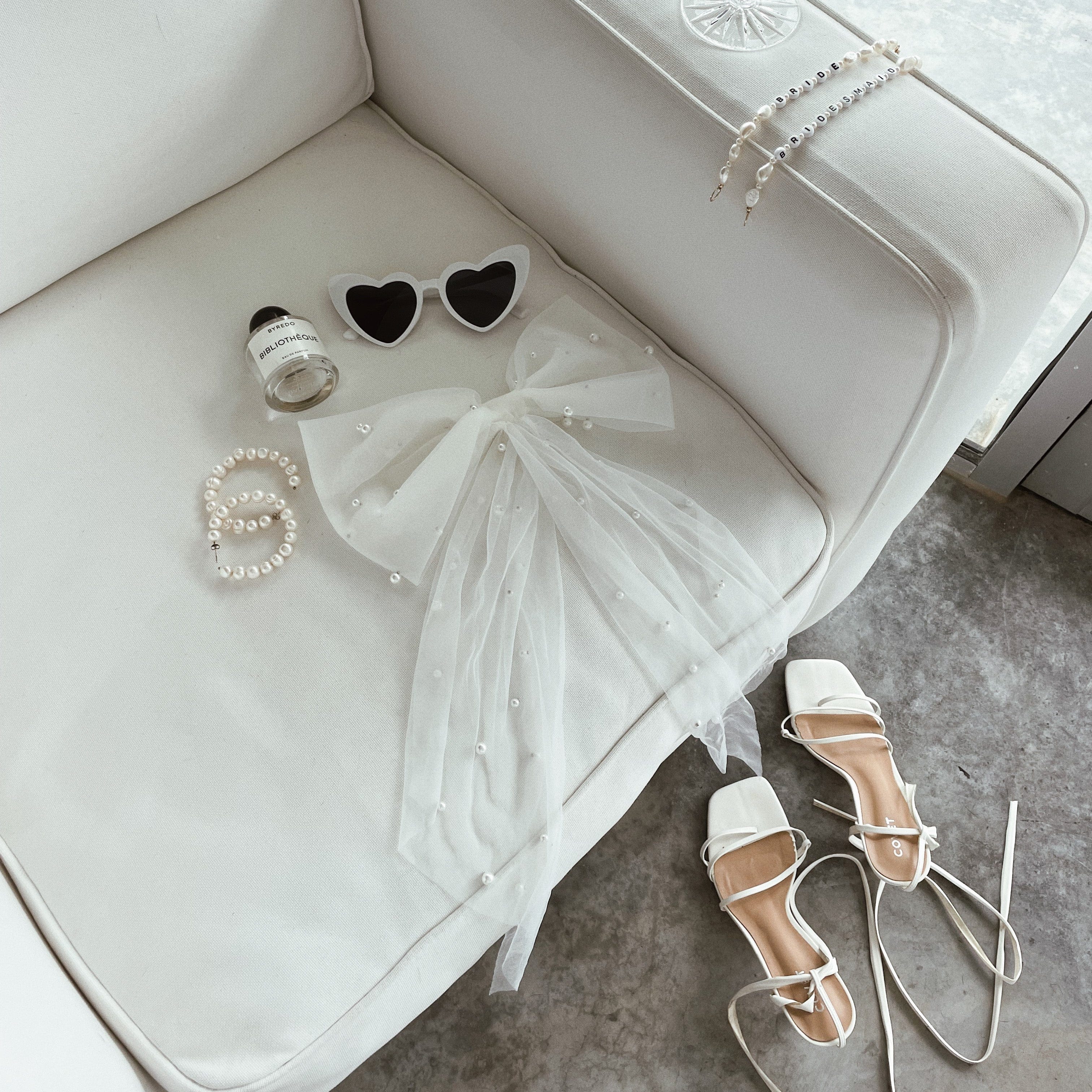 haley pearl bow by Claya
