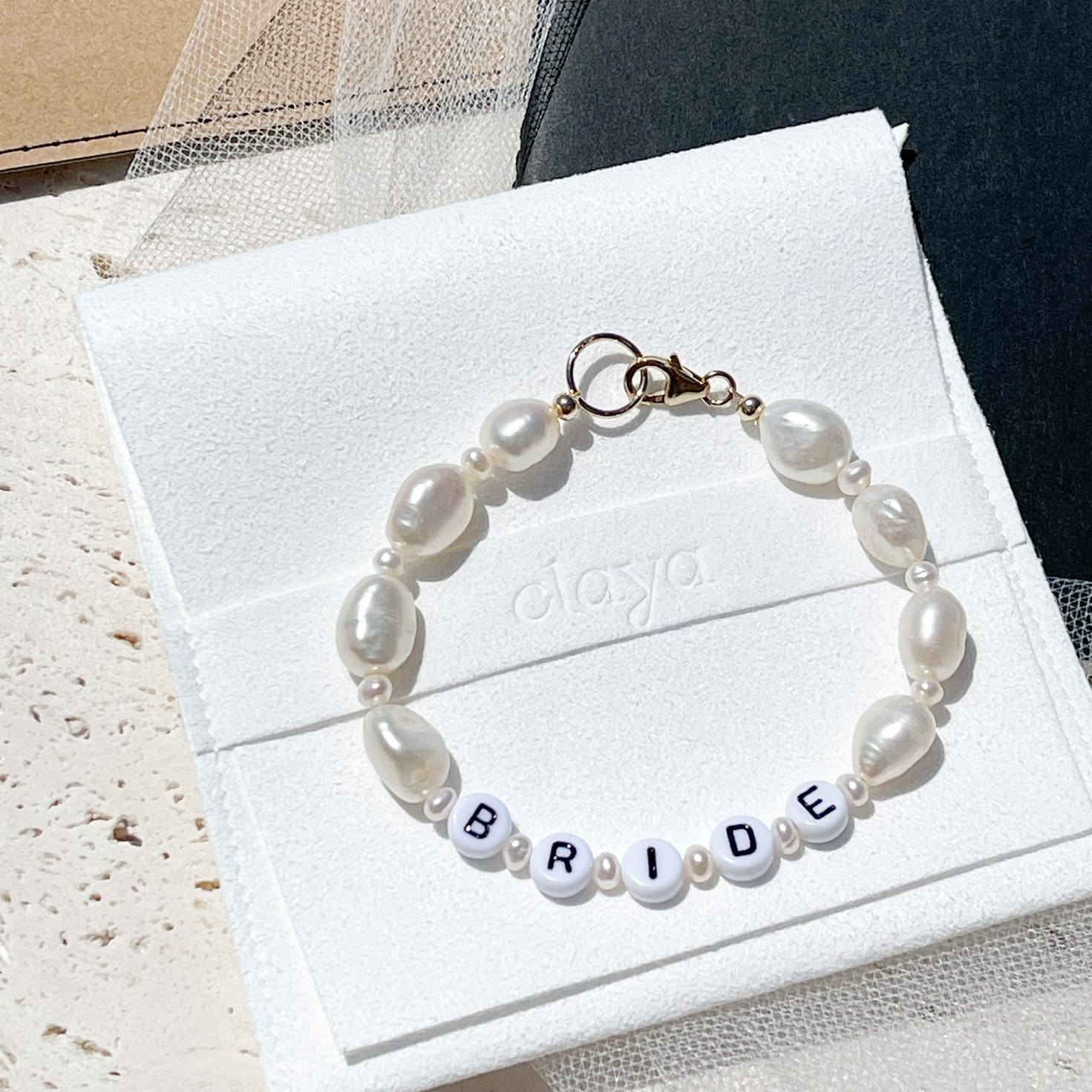 letters and pearls bracelet by Claya