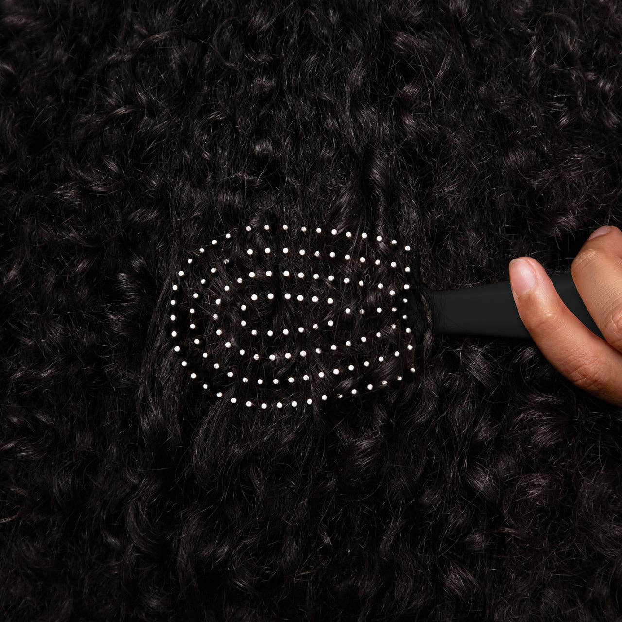Mini Black Detangling Flexi Brush by KITSCH