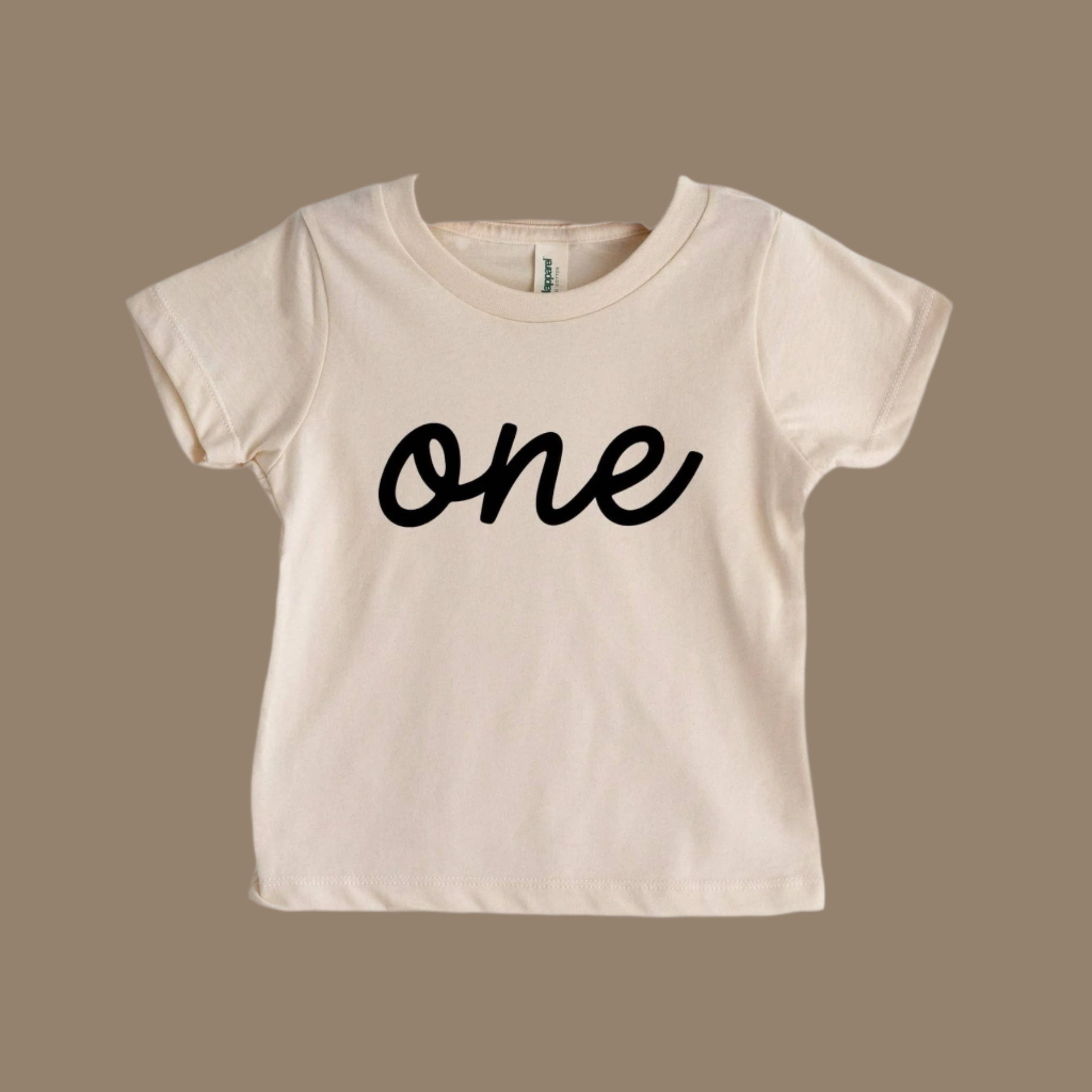 Script "One" Cream Organic Baby Tee by Gladfolk