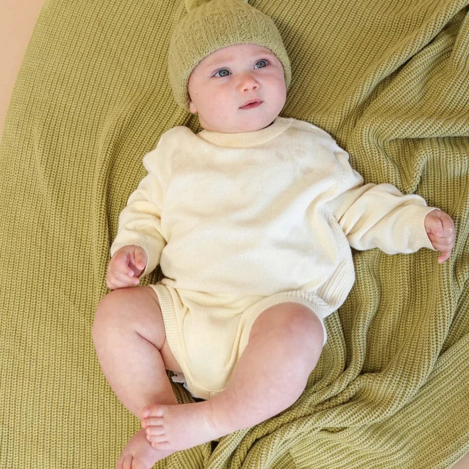 Side Rib Oversized Romper in Milk by Grown