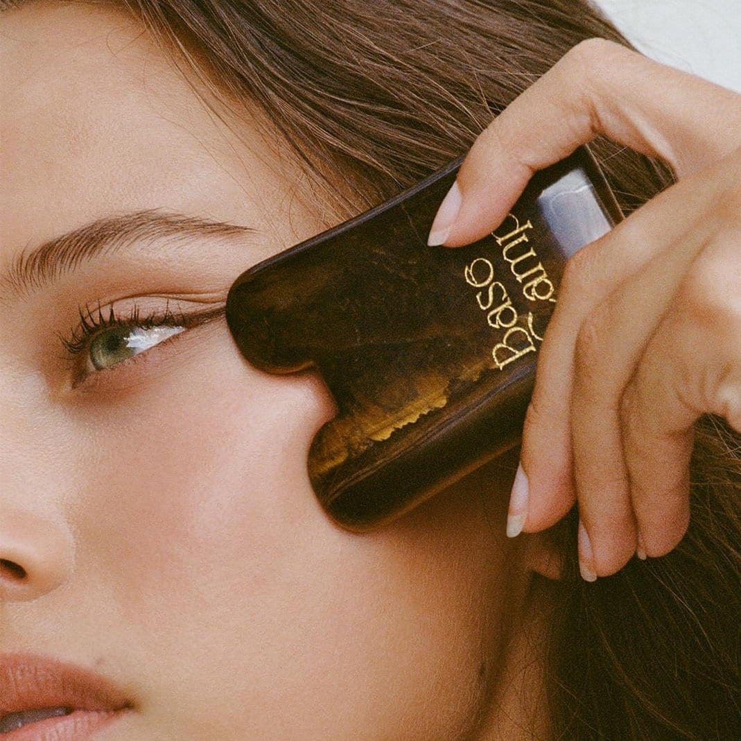 tigers eye gua sha. by Base Camp Beauty