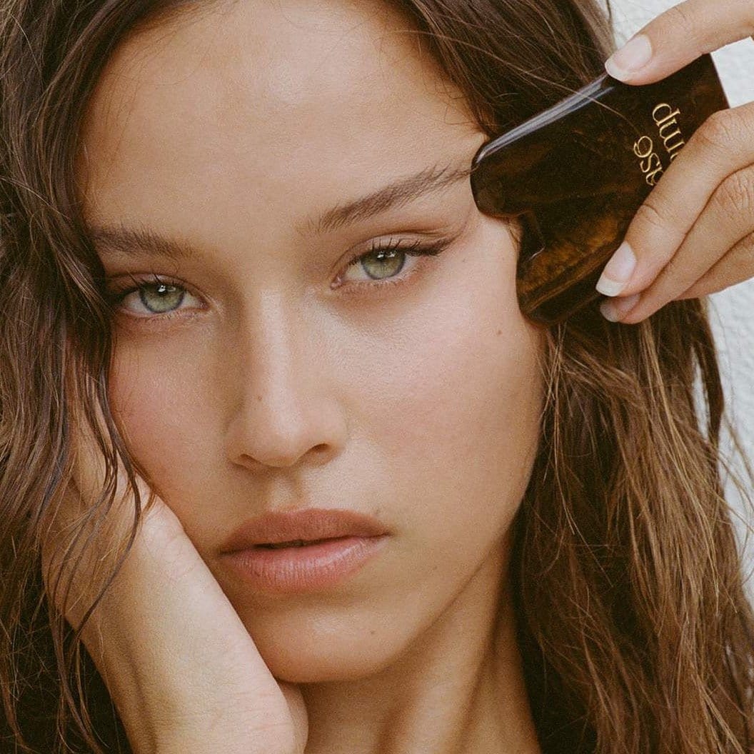 tigers eye gua sha. by Base Camp Beauty