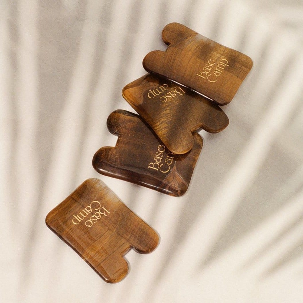 tigers eye gua sha. by Base Camp Beauty