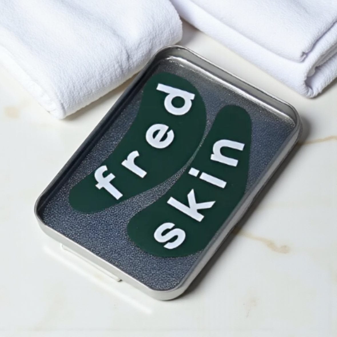 Fredskin Reusable Silicone Eye Mask - Green or Orange green by Fredskin