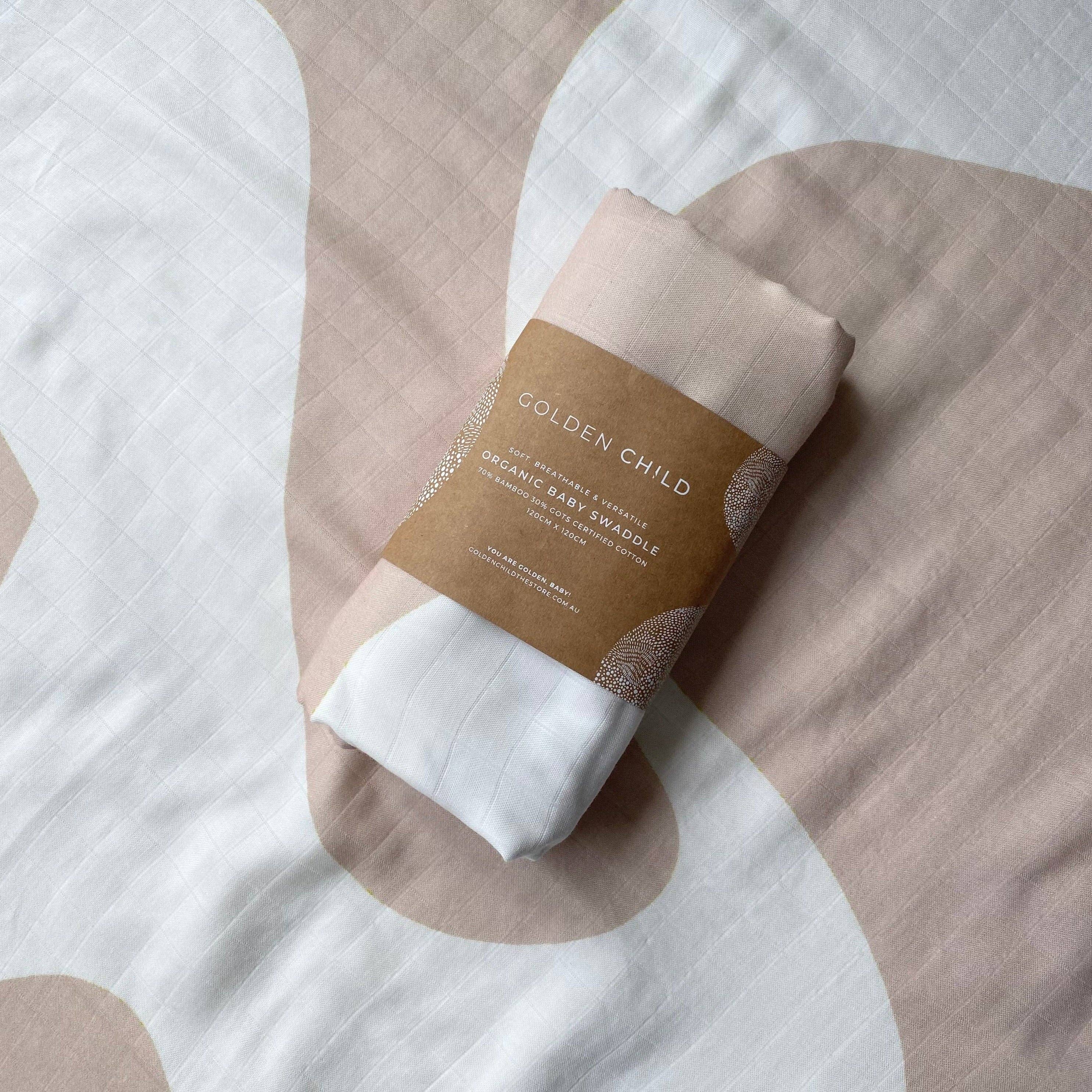 Golden Child Holiday Patterned Baby Swaddle - Dreamy Taupe and Golden Blue by Golden Child