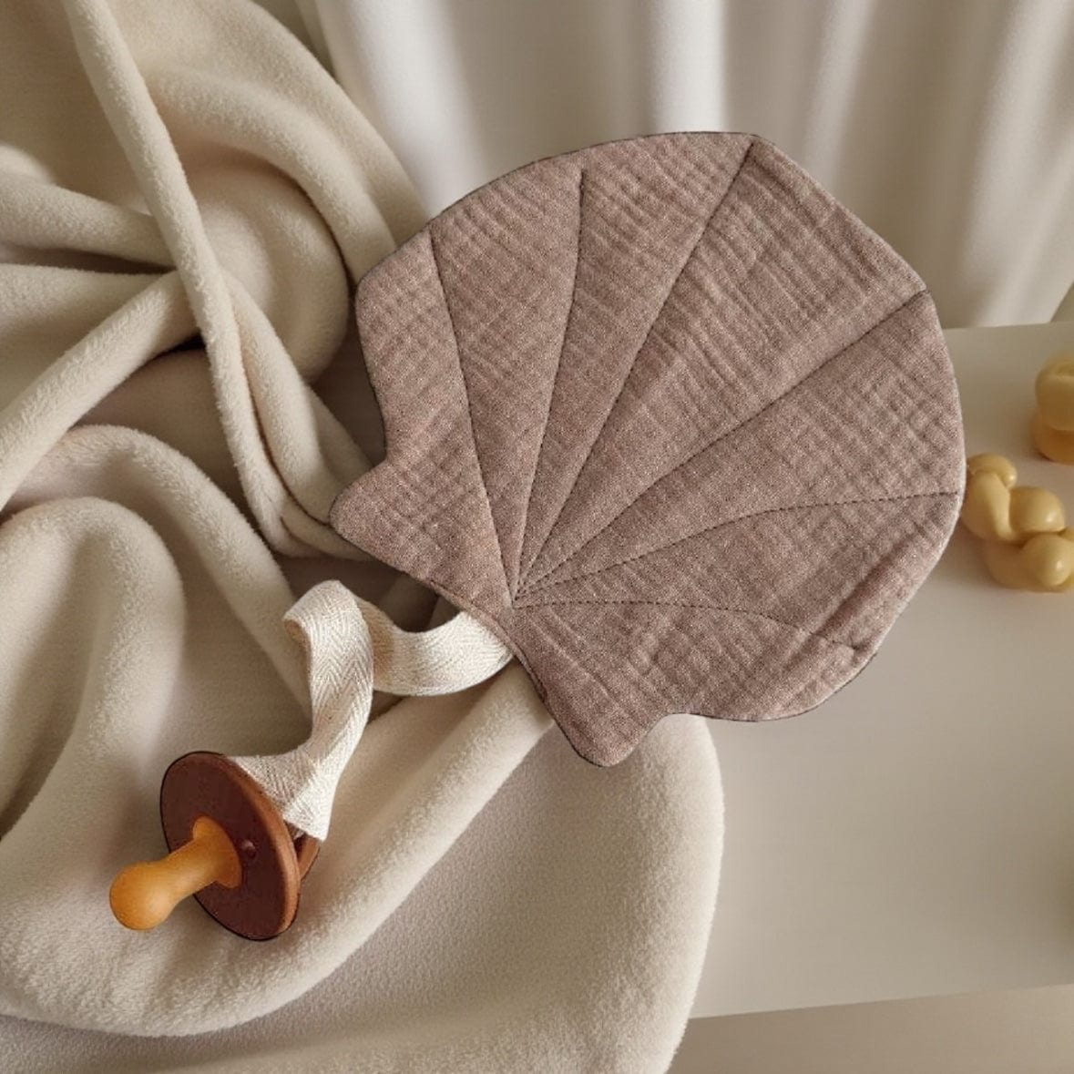Lion + Lamb the Label Shell Dummy Holder in Blush and Taupe Blush by Lion + Lamb the Label