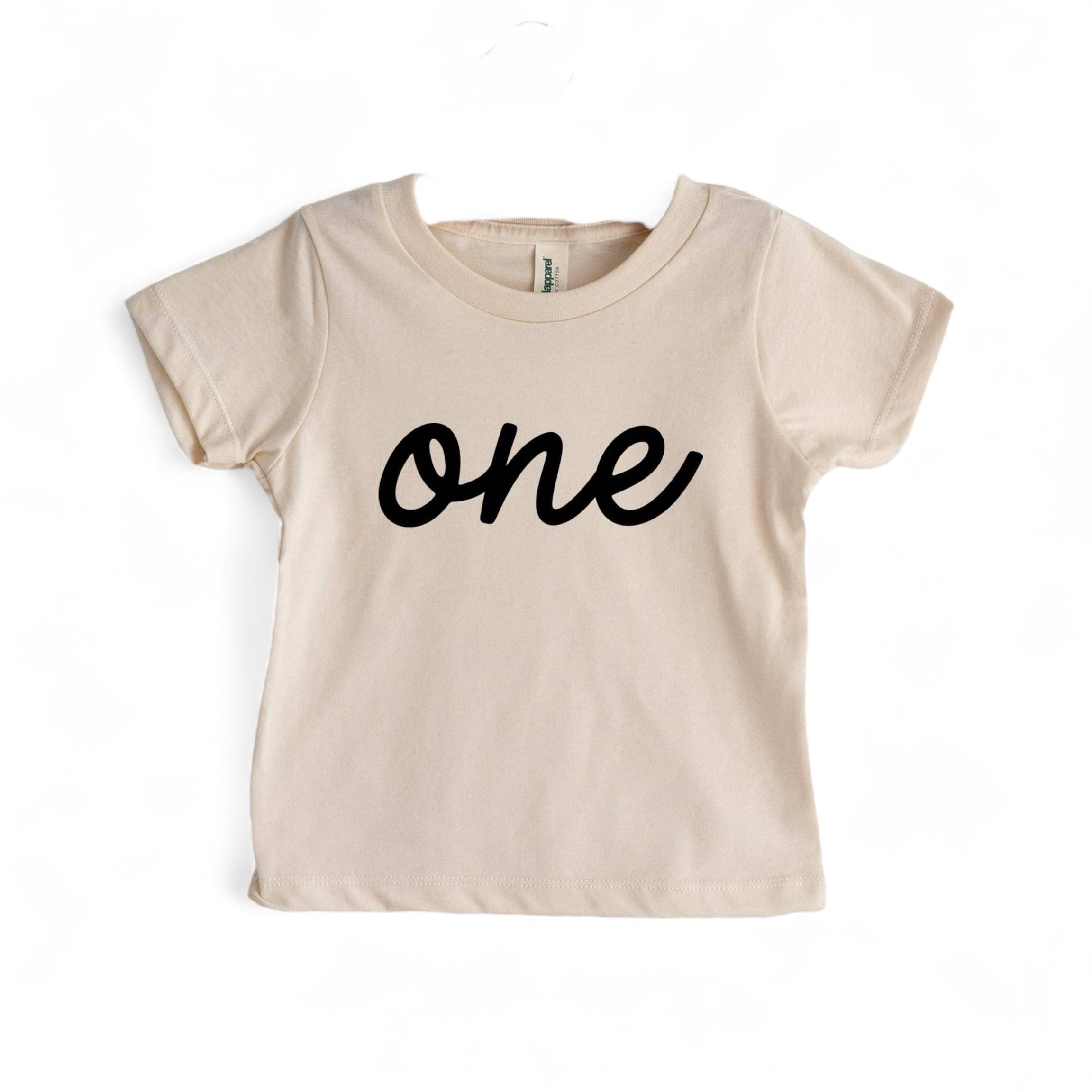 Script "One" Cream Organic Baby Tee by Gladfolk